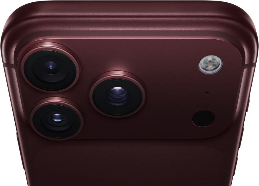 バーガンディ（ダークレッド）のiPhone 18 Pro Max。背面の外観：上部にPro Fusionカメラシステムがあり、3つのレンズ、一部が閉じた可変絞り用ブレード、フラッシュ、マイク、LiDARスキャナが見えている。上部の外観：モバイル通信アンテナ、フラットな側面、丸みを帯びたエッジ